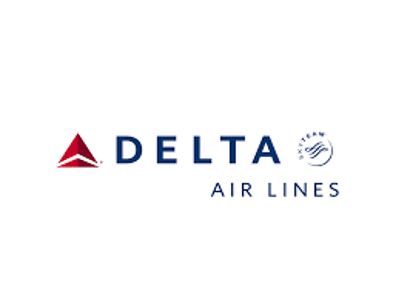 The image features the Delta Air Lines logo. On the left is a red, triangular shape resembling an airplane wing. To the right of the symbol is the word "DELTA" in bold, blue letters. Below that, "AIR LINES" is written in smaller, blue letters. To the right of "DELTA" is the SkyTeam alliance logo, which is a blue circle containing stylized wave-like shapes.